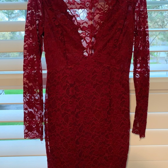 Red lace dress by “Dress Forum” brand based in LA - Picture 2 of 2